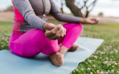 Close-up on a person's focused expression during a stretch.